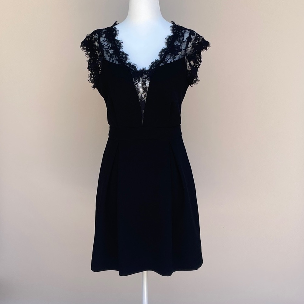 Black V-neck mini dress with lace detail